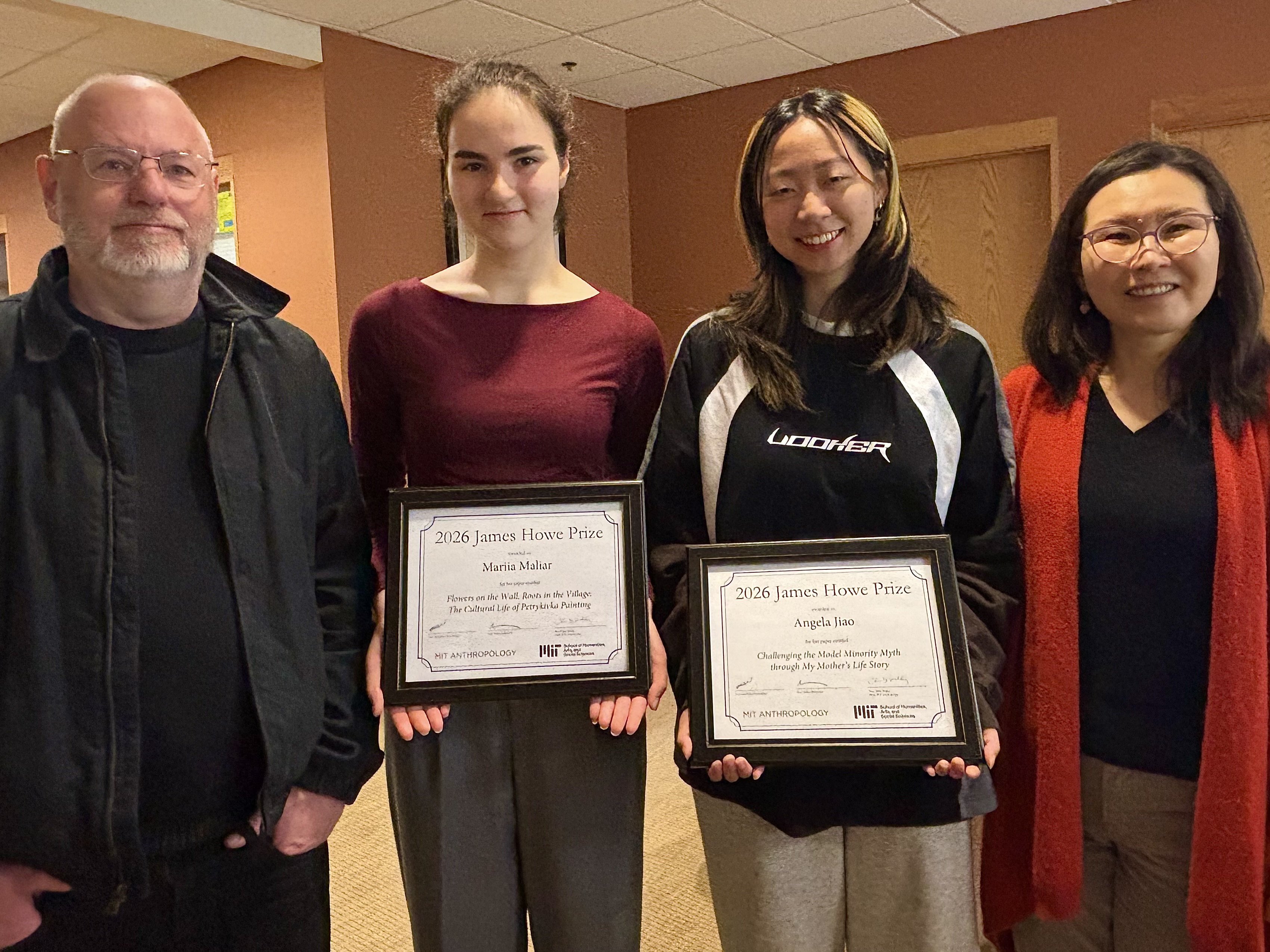 Professor Stefan Helmreich, Mariia Maliar, Angela Jiao, and Professor Manduhai Buyandelger stand side by side with the two award winners in the middle holding their award certificates.